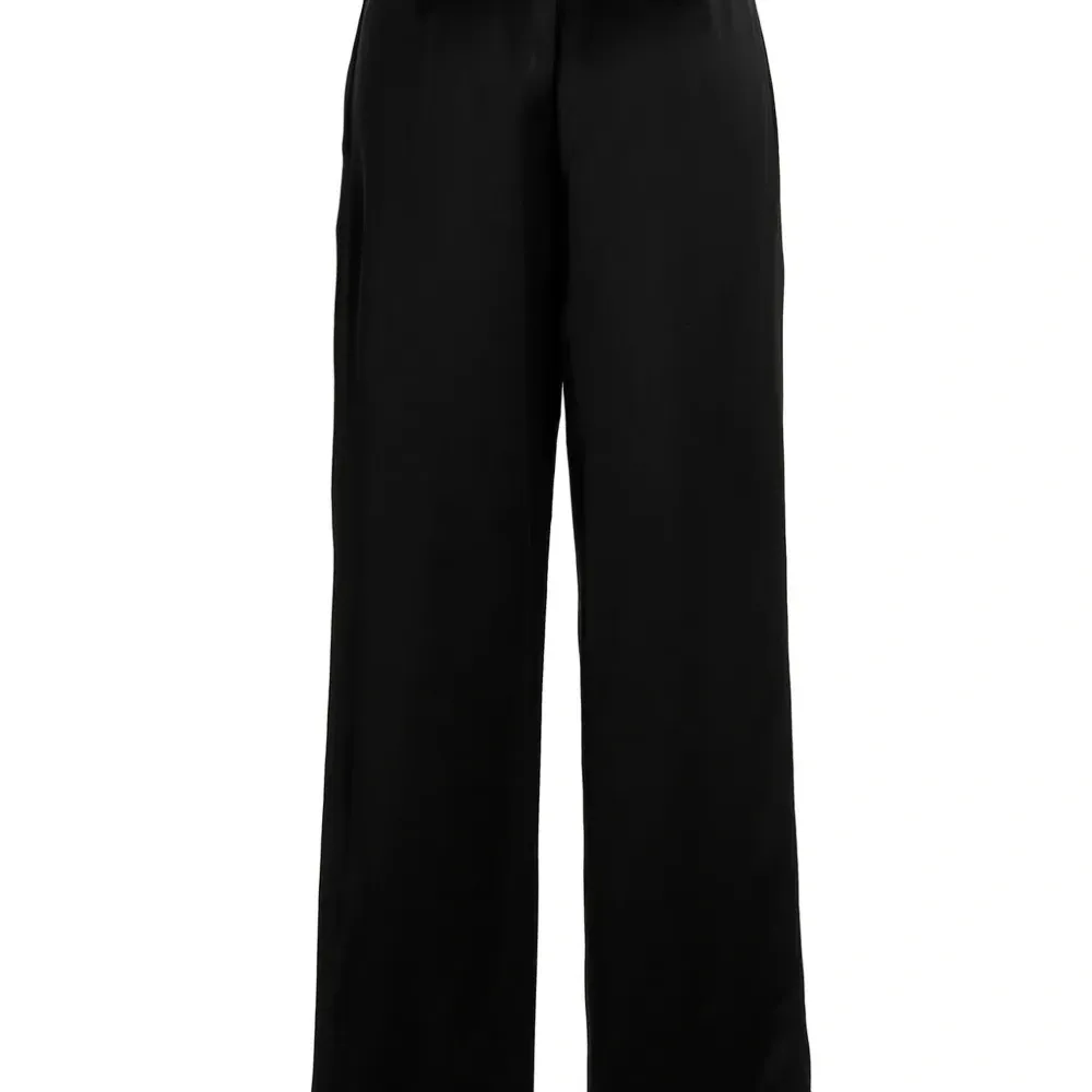 Плиссированные брюки Плиссированные брюки