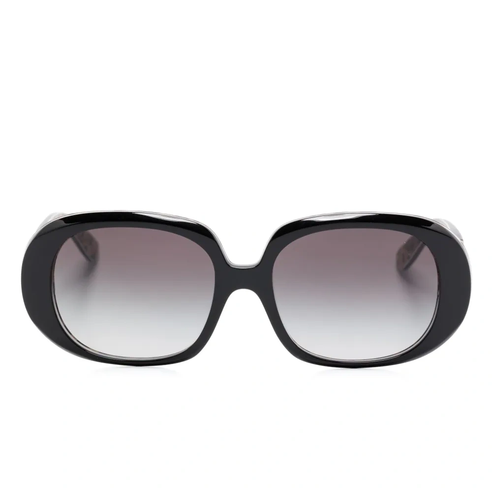 Солнцезащитные очки в массивной оправе