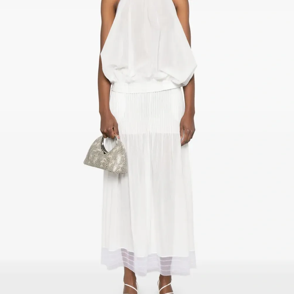 Брюки с защипами