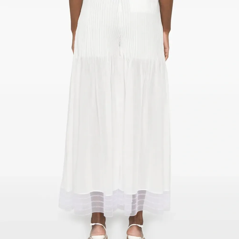 Брюки с защипами