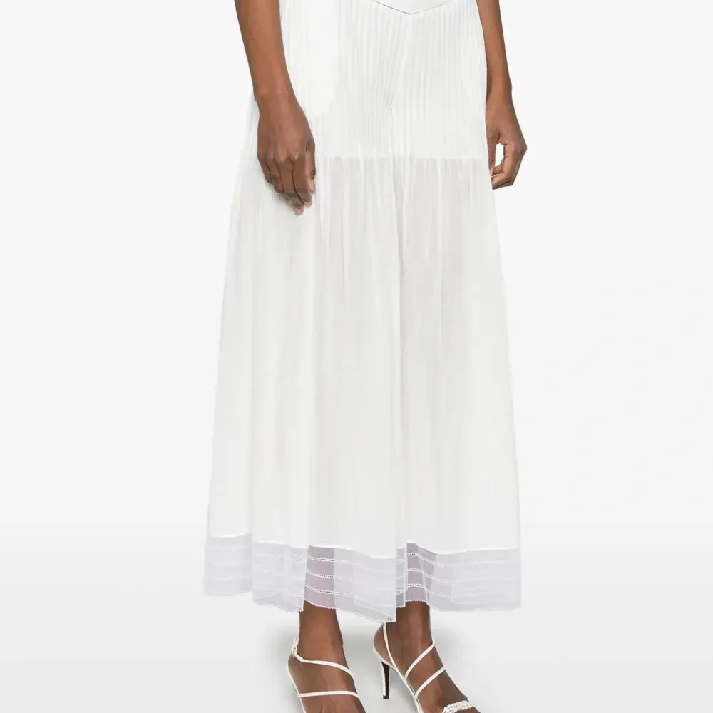 Брюки с защипами