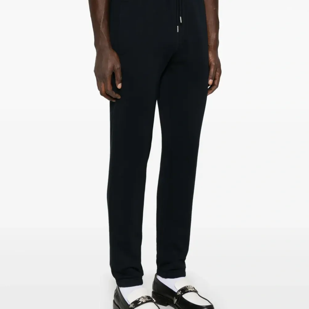 Спортивные брюки с вышитым логотипом