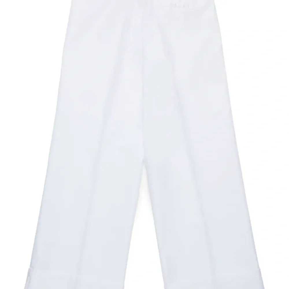 Брюки с карманами Брюки с карманами