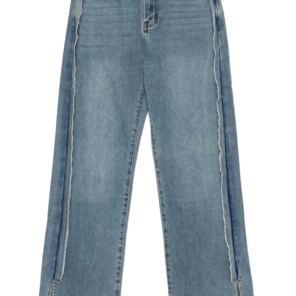 Джинсы с необработанными краями