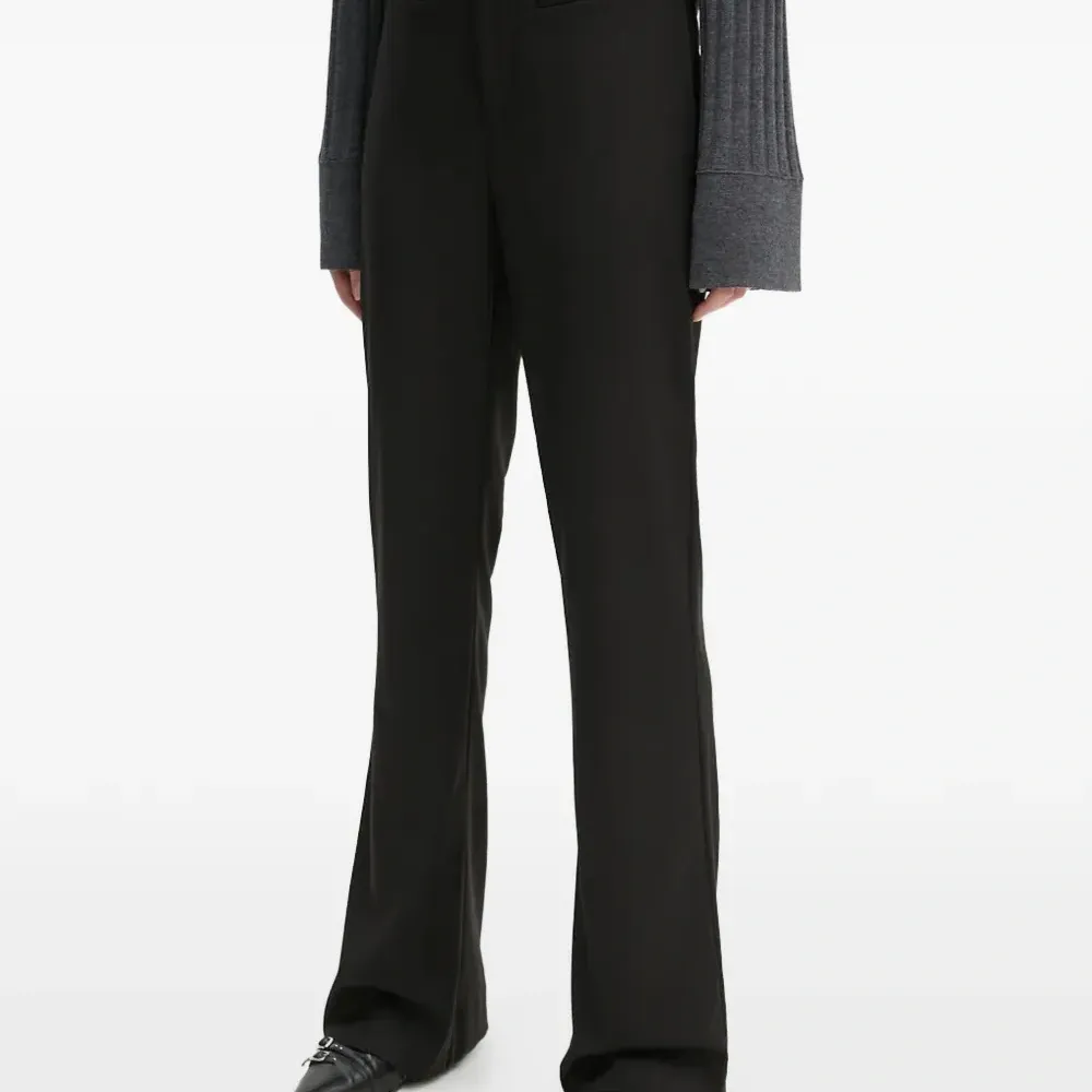 Брюки с прорезными карманами