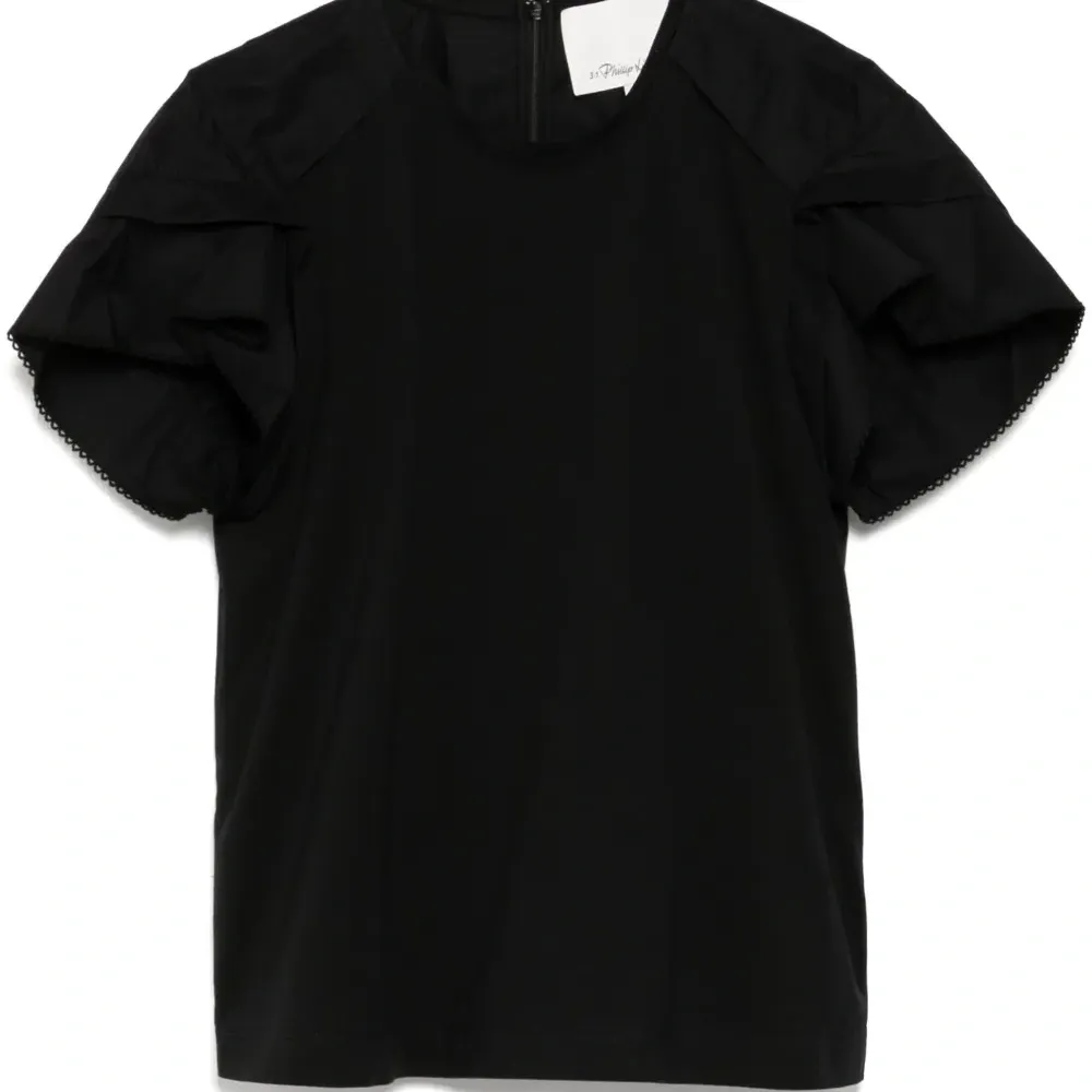 Блузка с объемными рукавами