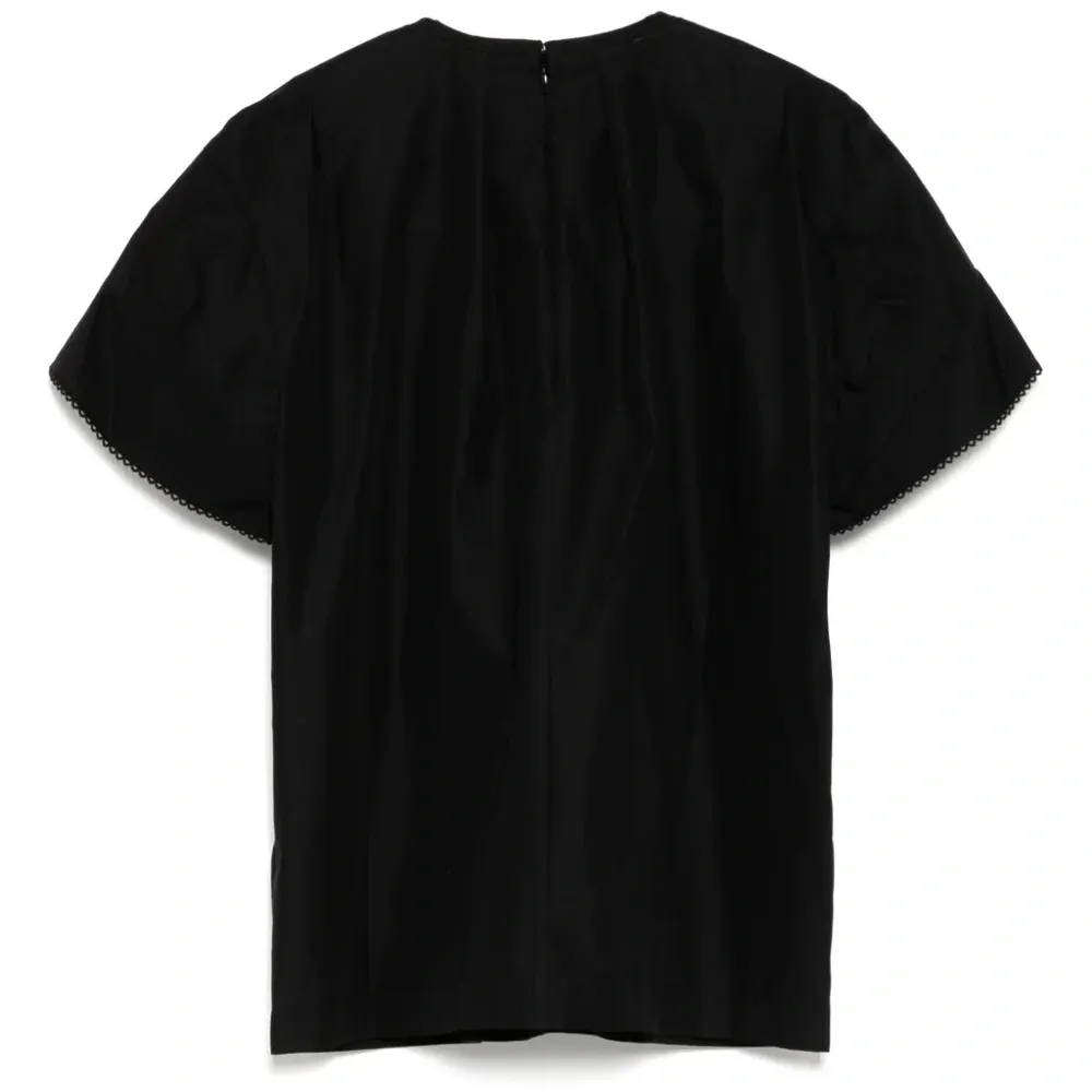 Блузка с объемными рукавами