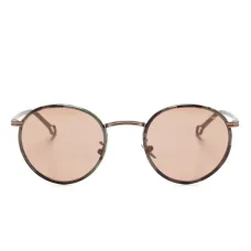 Солнцезащитные очки в круглой оправе
