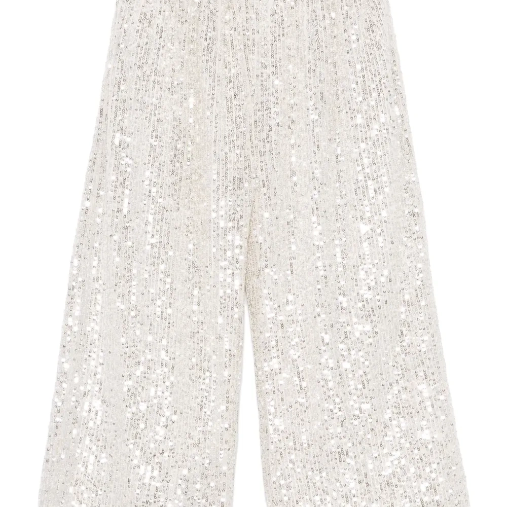 Широкие брюки с пайетками