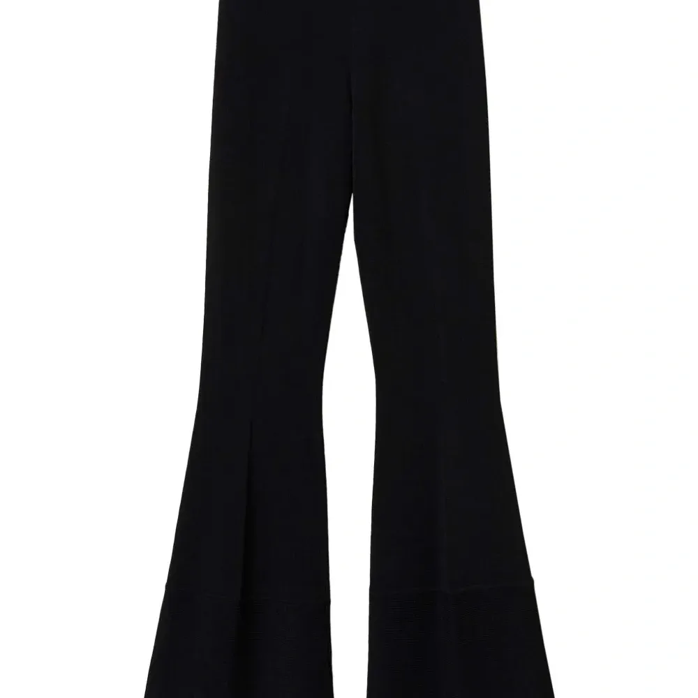 Расклешенные брюки с геометричным узором