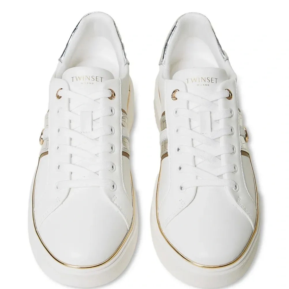 Кроссовки с декором Oval T