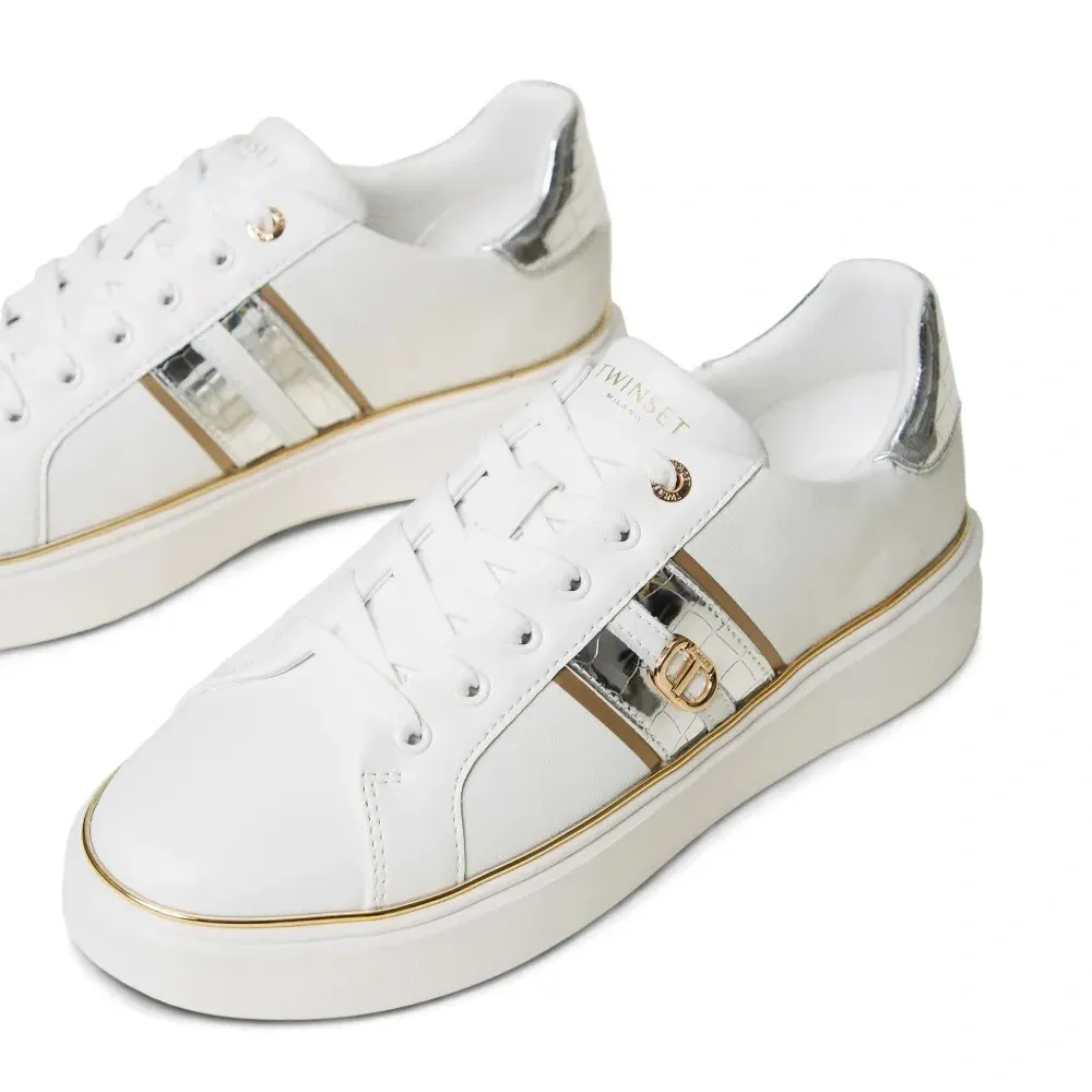 Кроссовки с декором Oval T