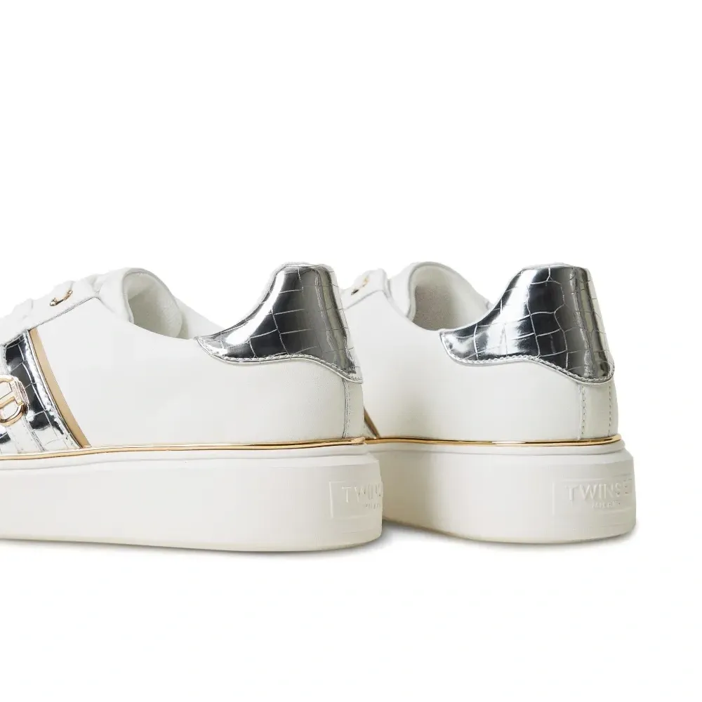 Кроссовки с декором Oval T