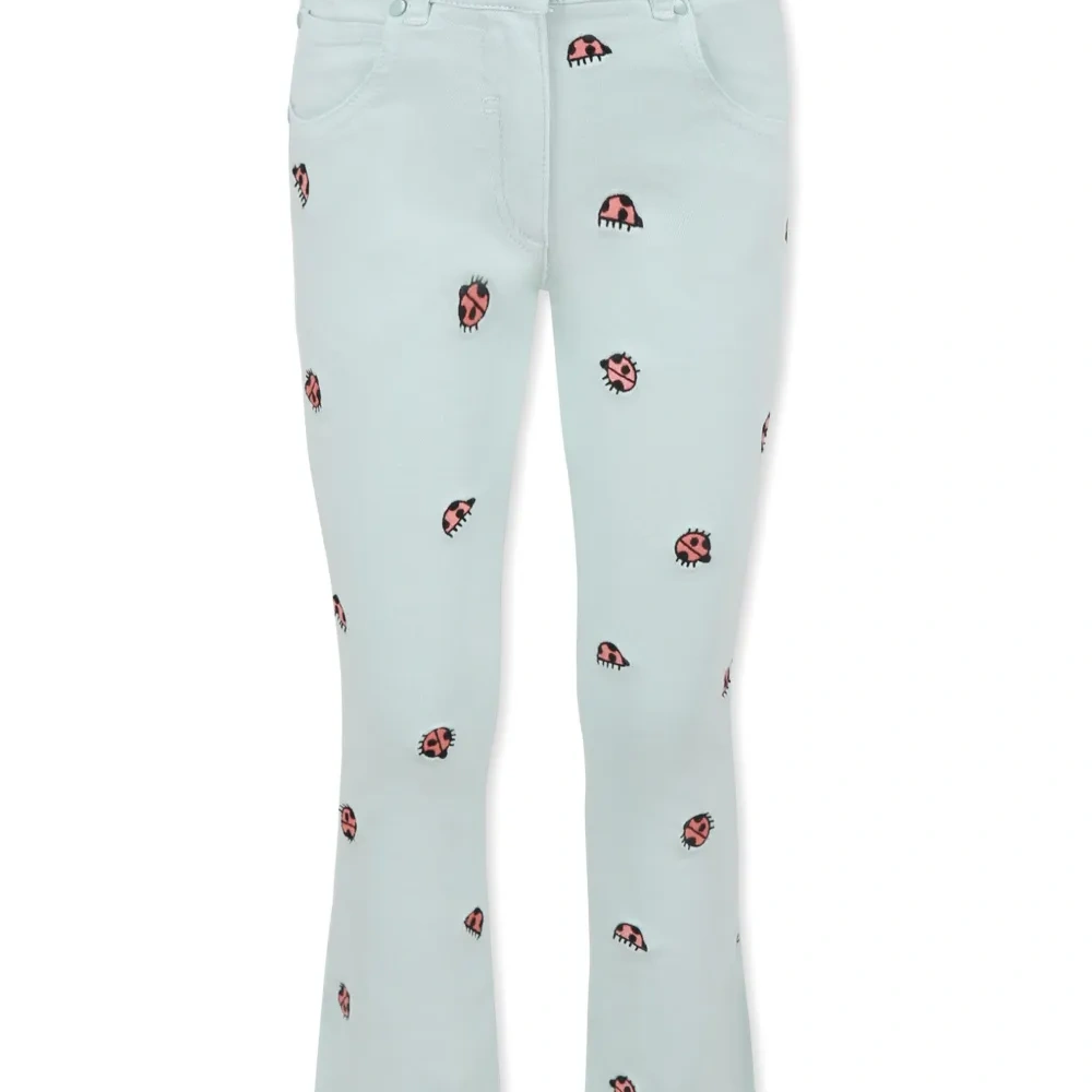 Джинсы с вышивкой