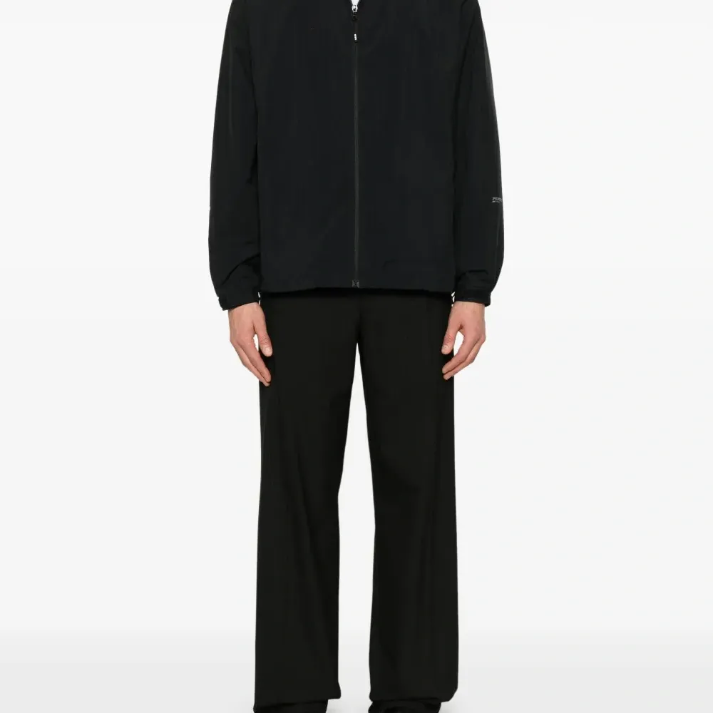 Брюки в тонкую полоску