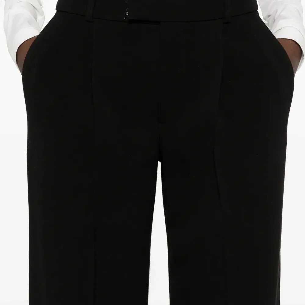 Брюки со складками