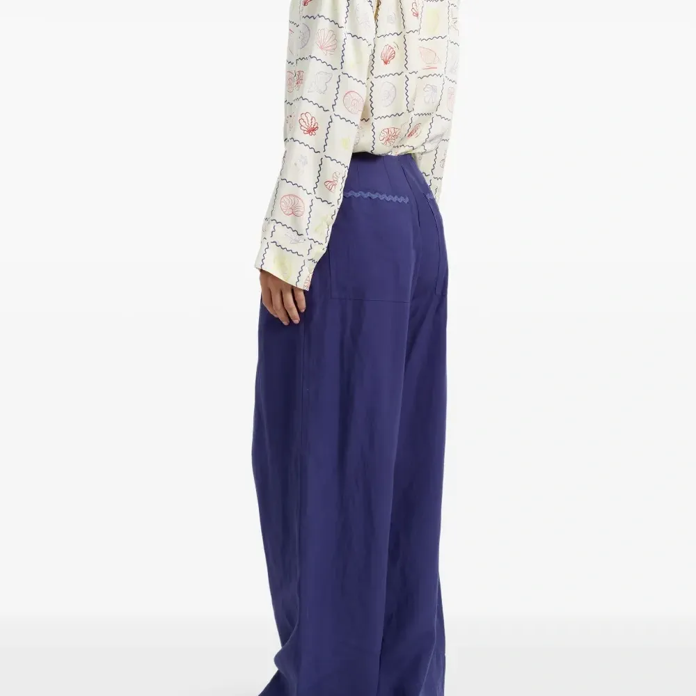 Брюки со складками