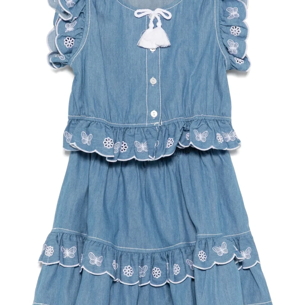 Комплект из блузки и юбки с вышивкой