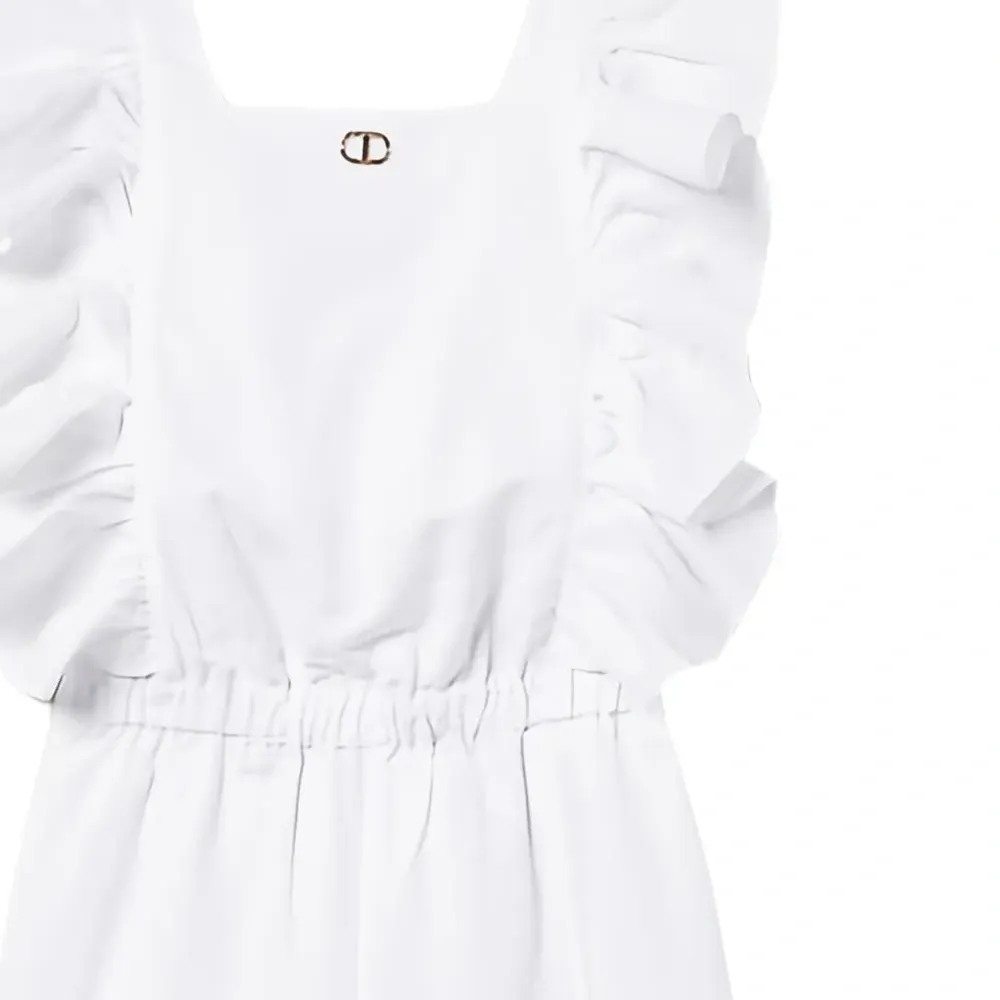 Комбинезон с оборками Комбинезон с оборками