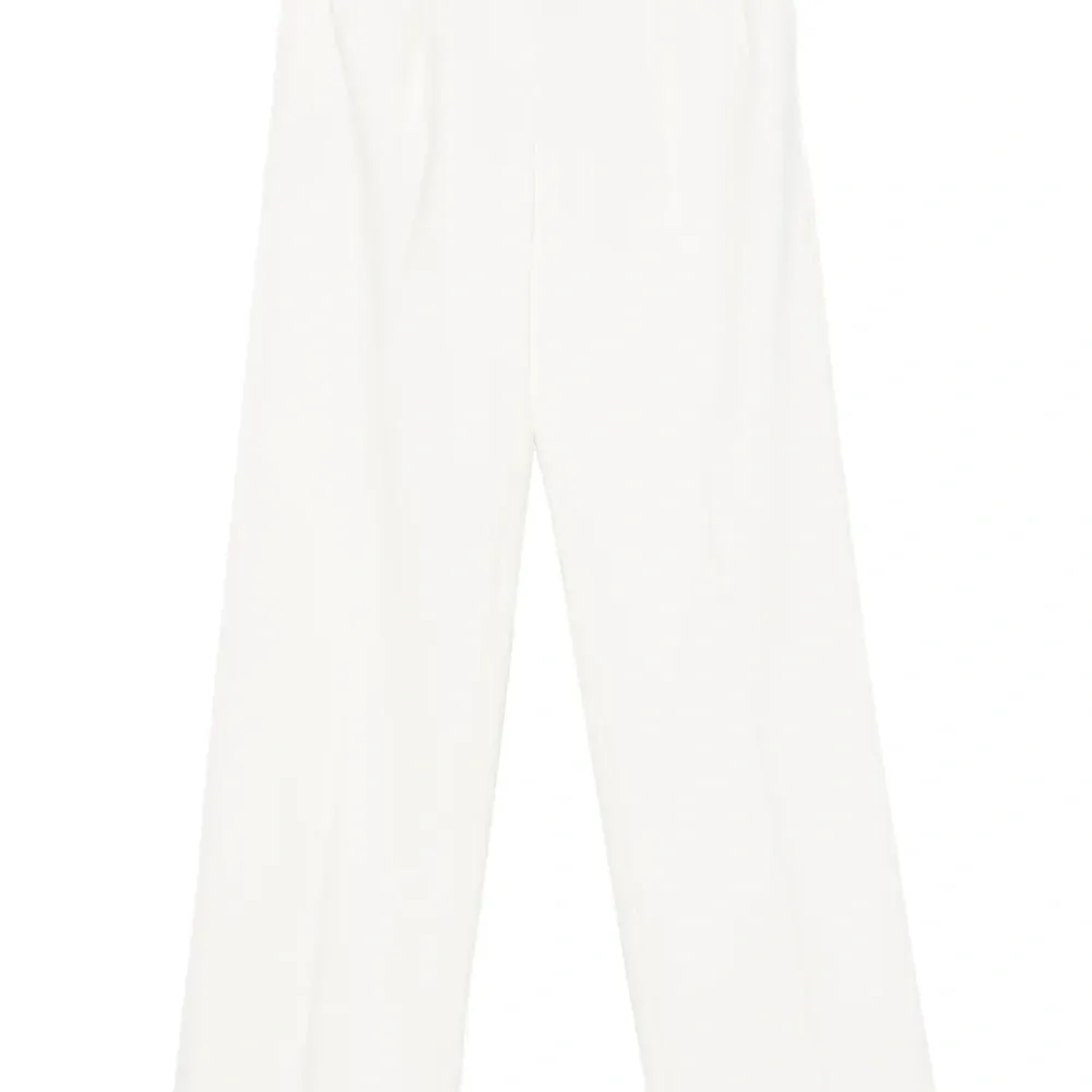 Плиссированные брюки