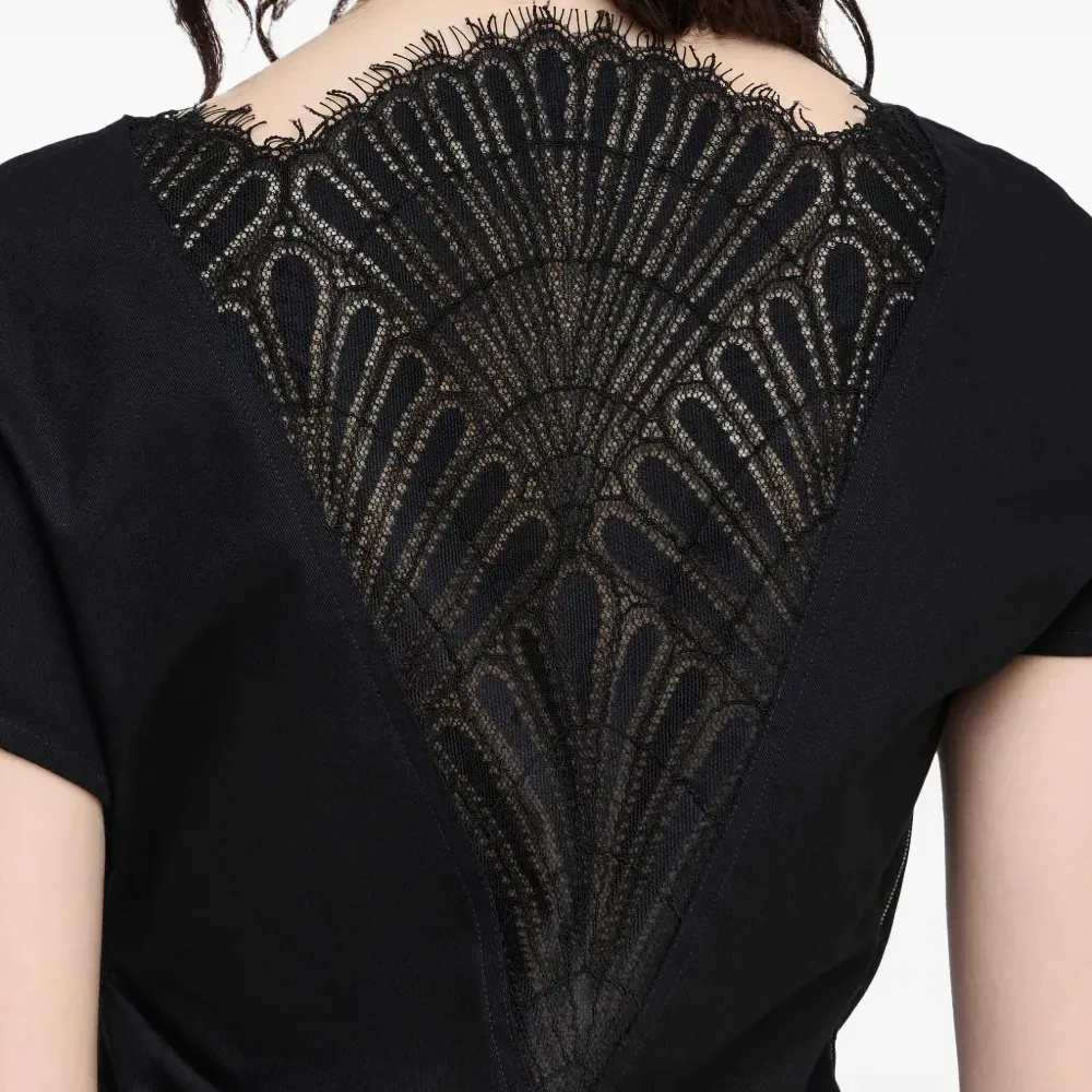 Блузка асимметричного кроя с драпировкой Блузка асимметричного кроя с драпировкой