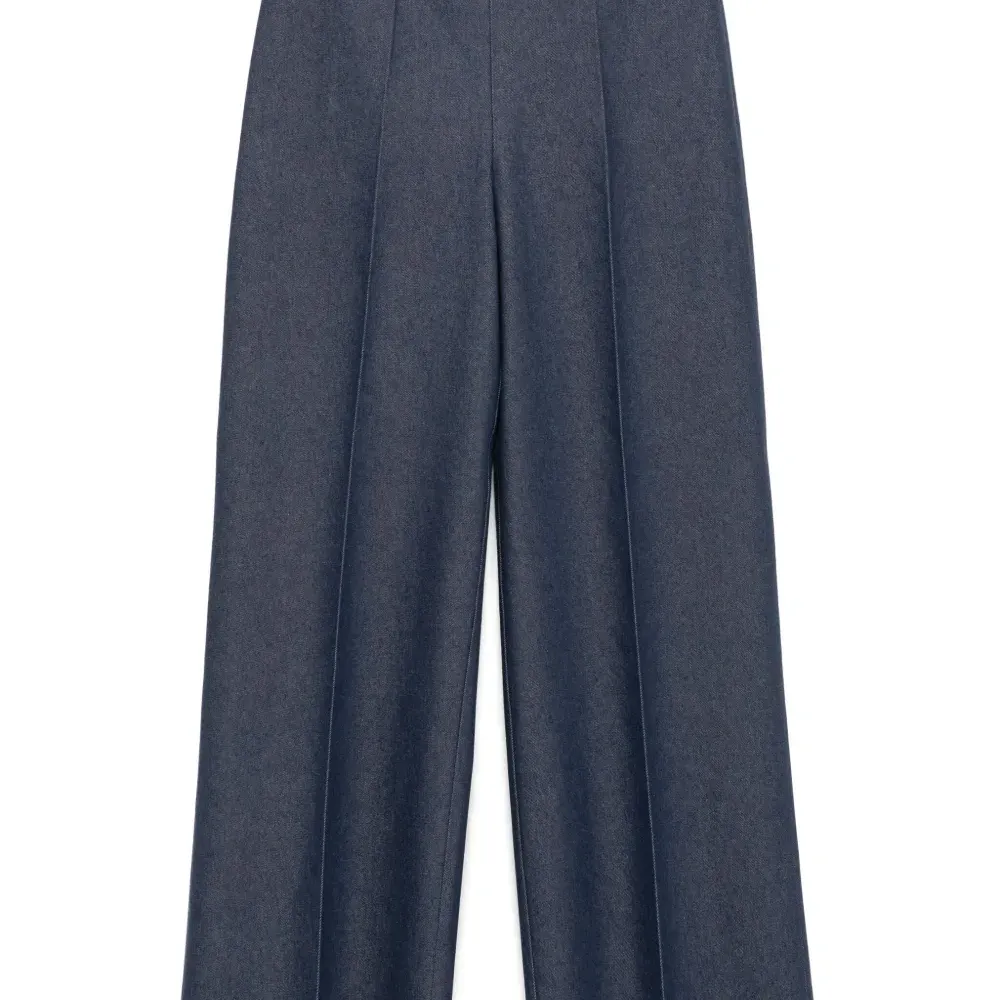 Брюки со складками