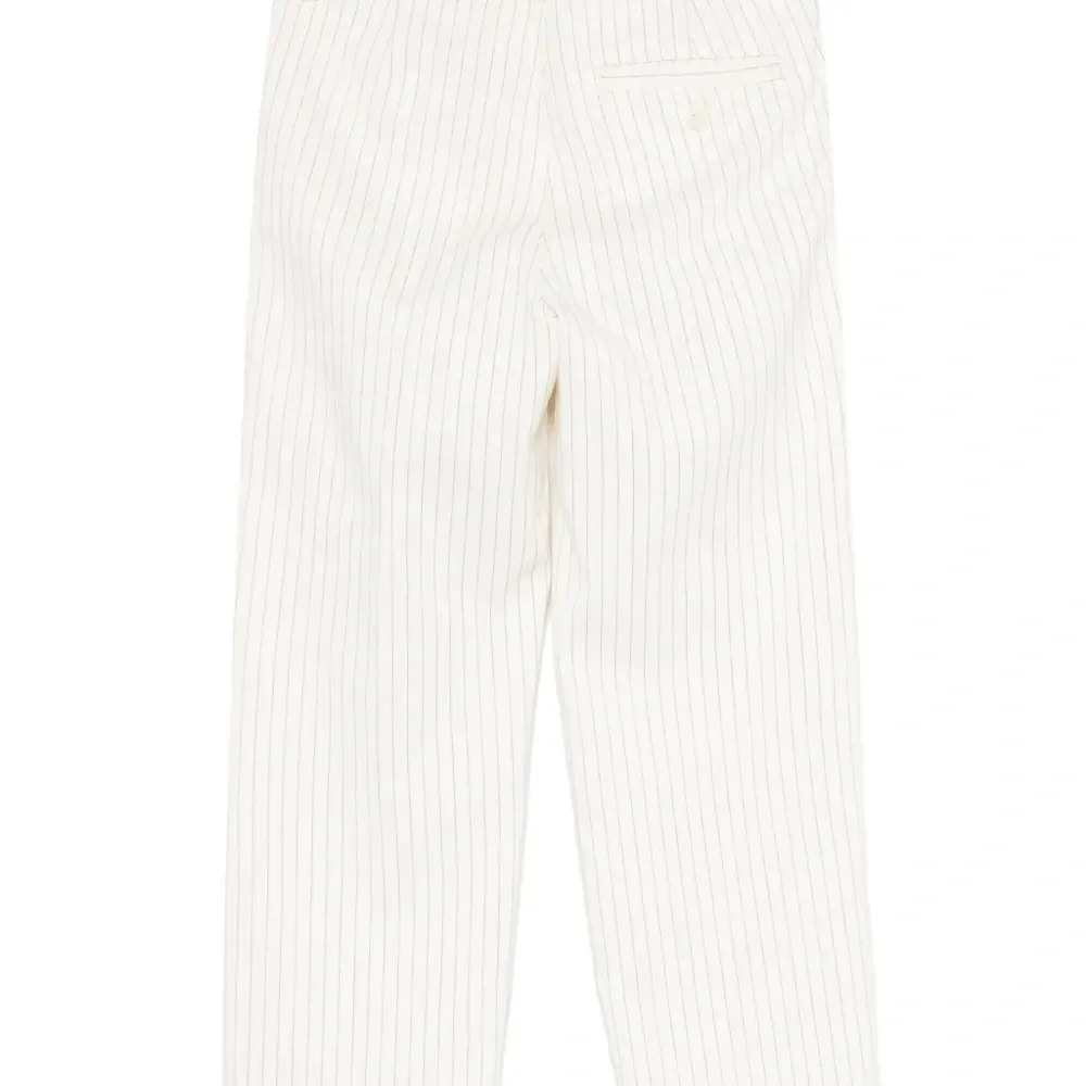 Брюки в полоску Брюки в полоску