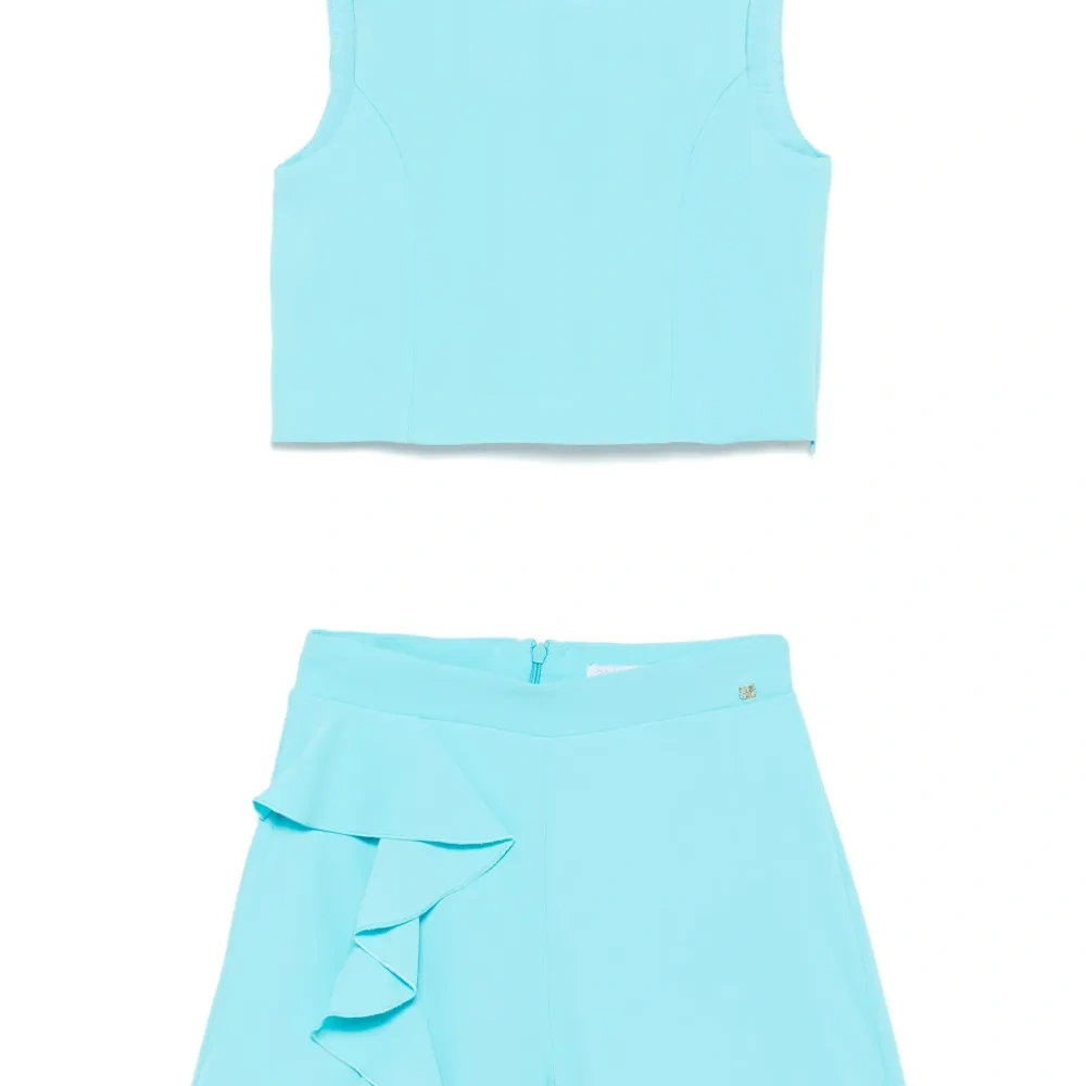 Комплект из топа и шортов с оборками