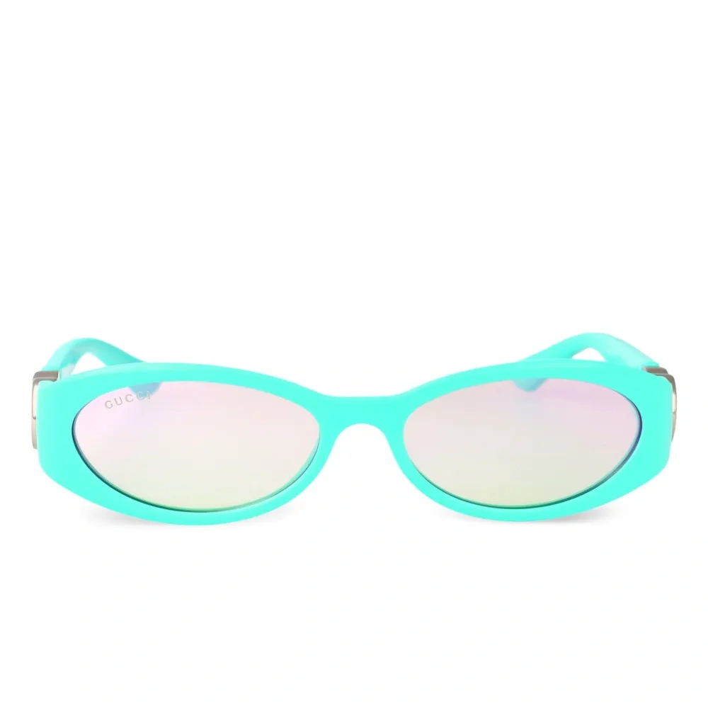 Солнцезащитные очки в овальной оправе