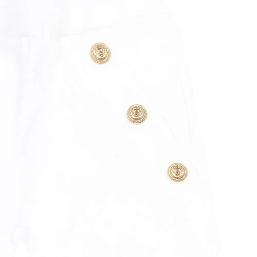 Брюки с гравированными пуговицами