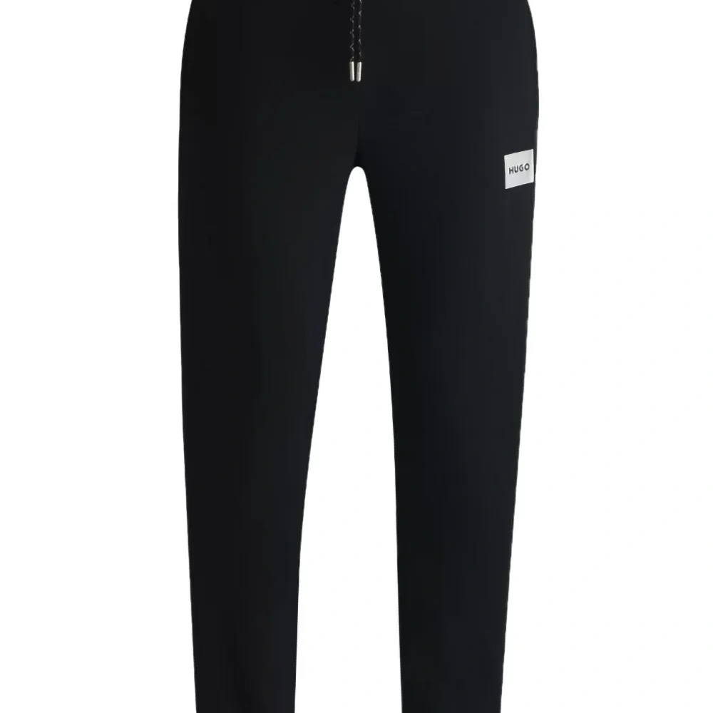 Спортивные брюки с логотипом Спортивные брюки с логотипом