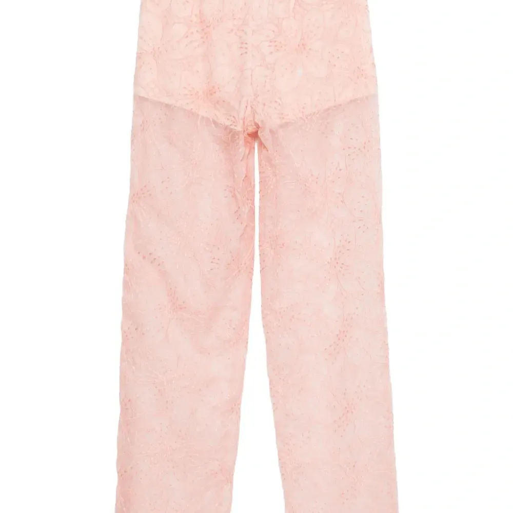 Брюки с цветочной вышивкой