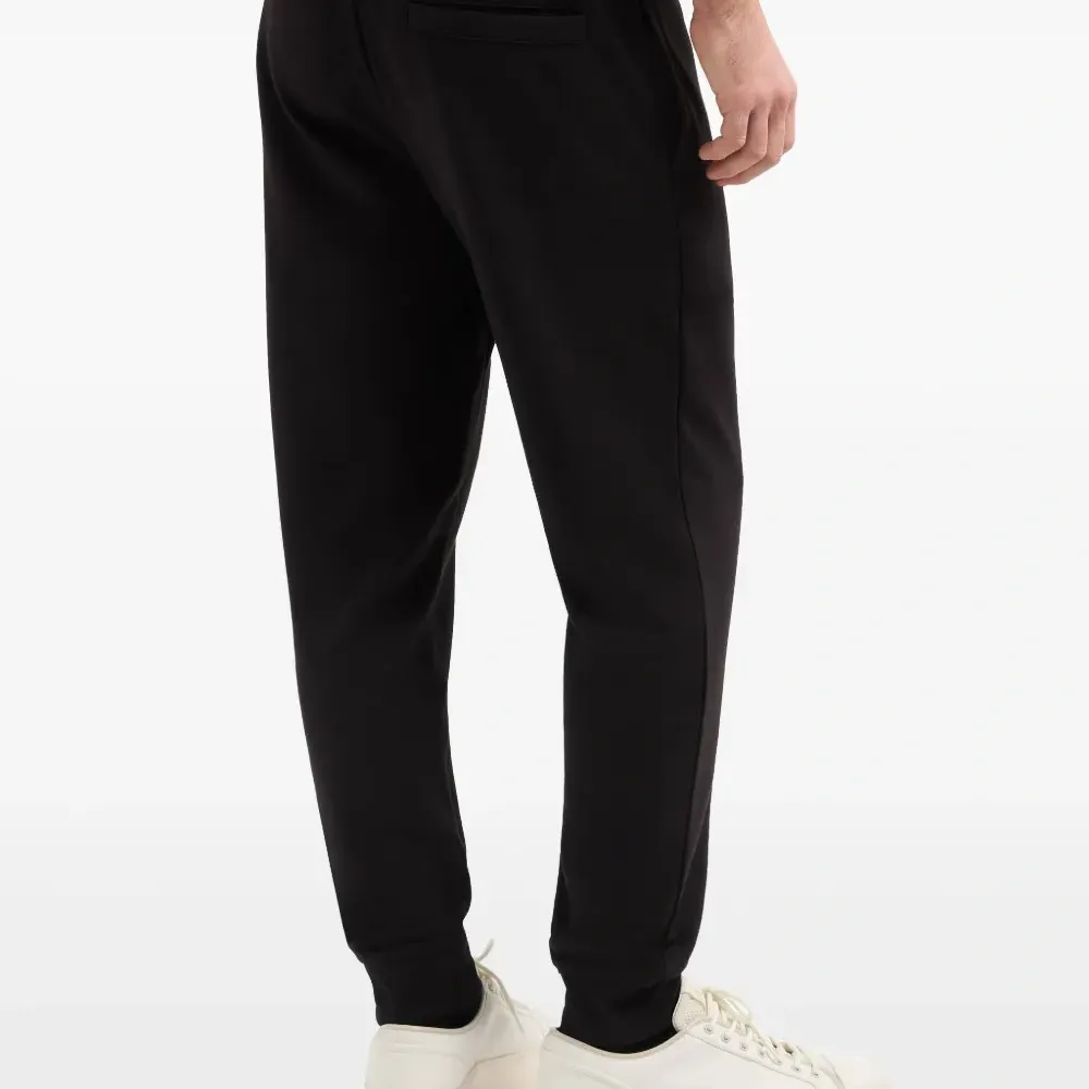 Спортивные брюки с вышитым логотипом