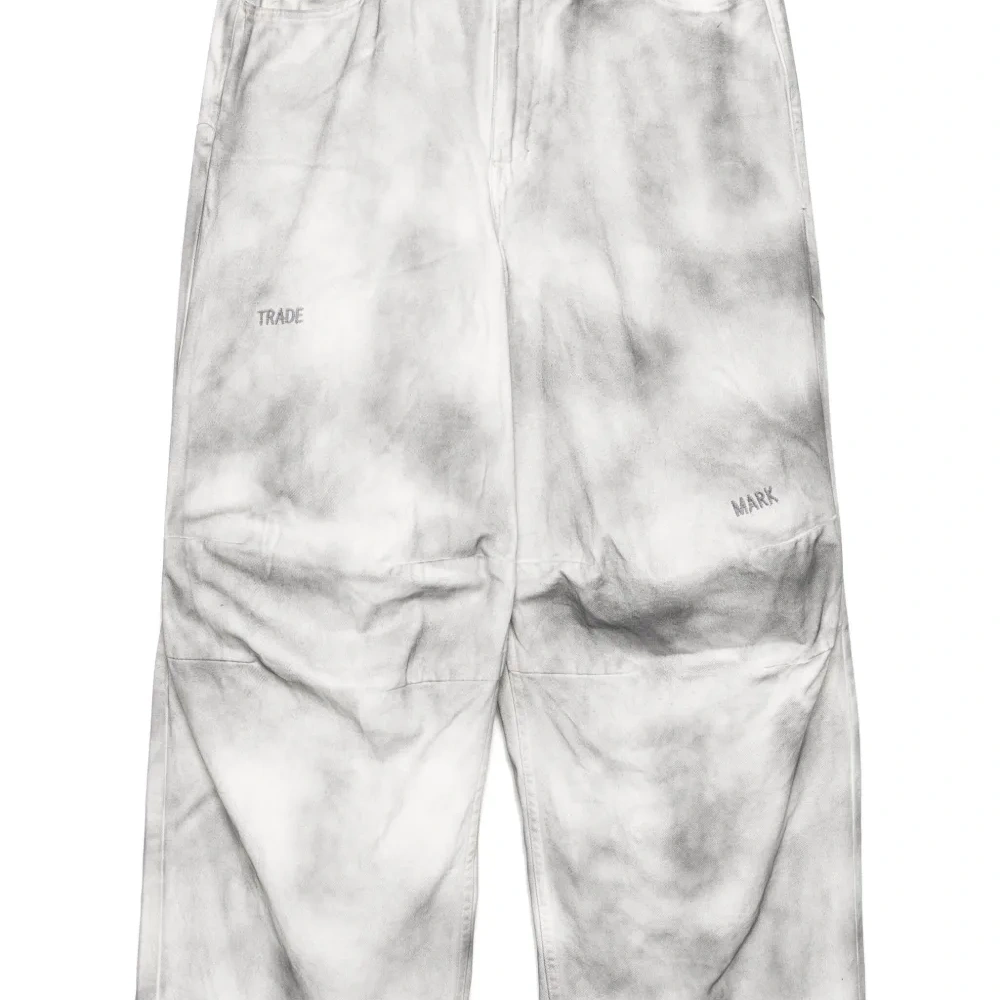 Джинсы с эффектом потертости