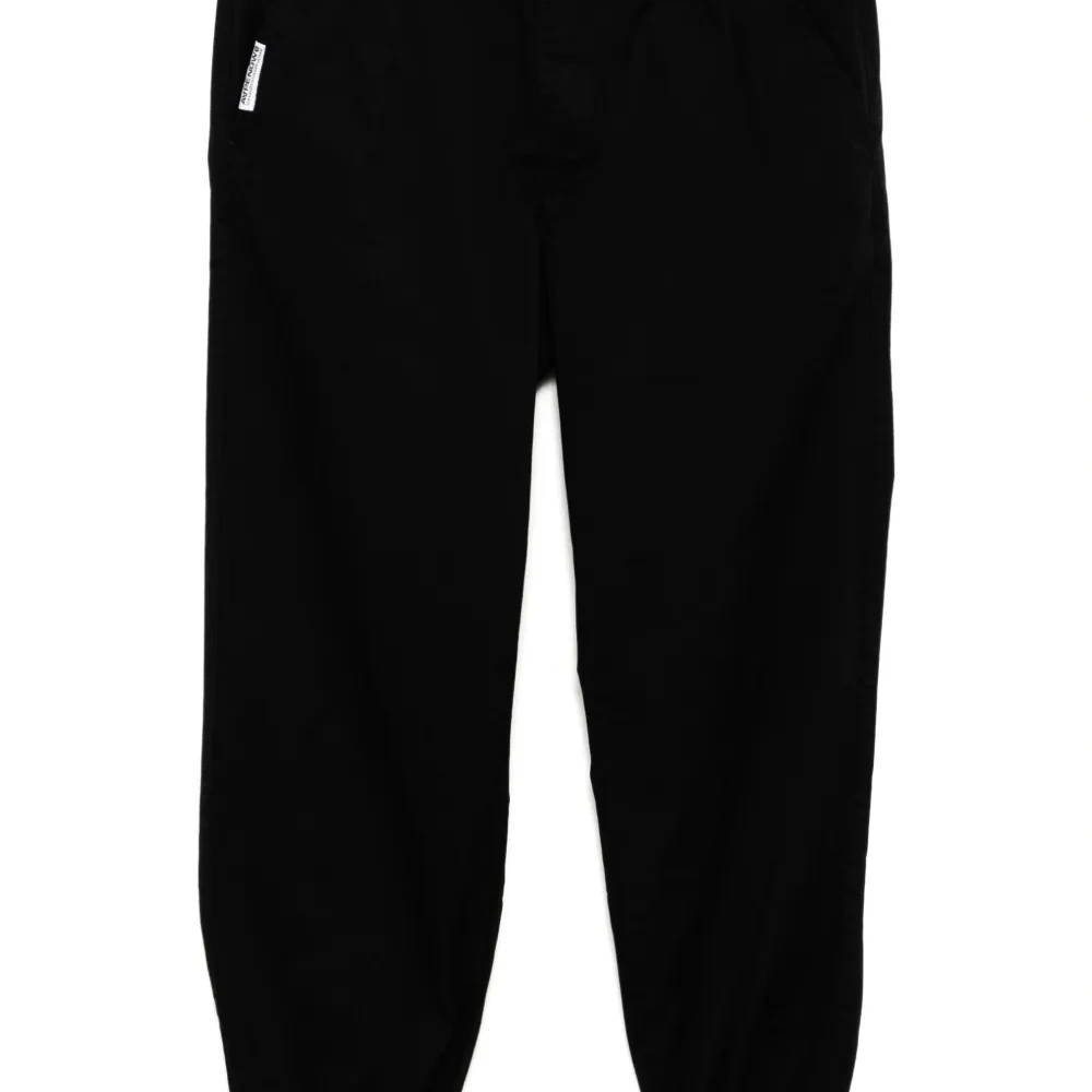 Зауженные брюки с нашивкой-логотипом