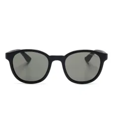 Солнцезащитные очки в круглой оправе