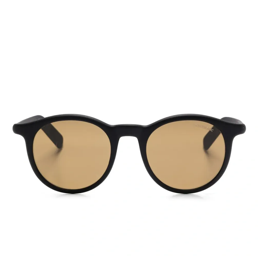 Солнцезащитные очки в круглой оправе