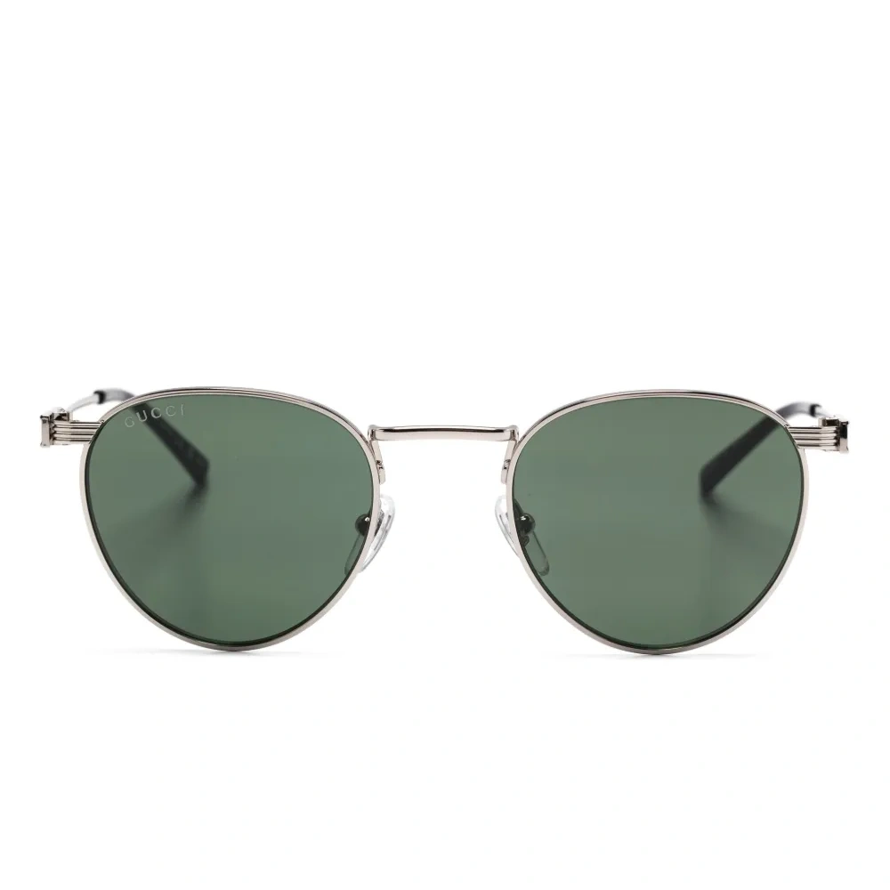 Солнцезащитные очки в овальной оправе