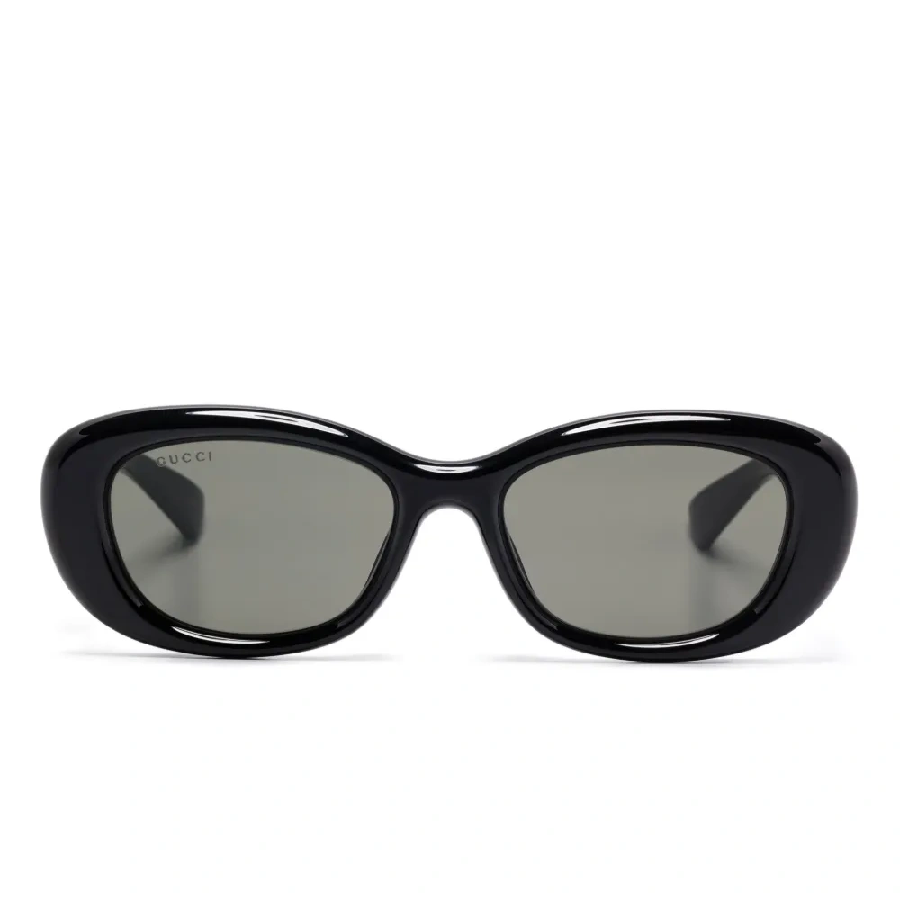 Солнцезащитные очки в овальной оправе