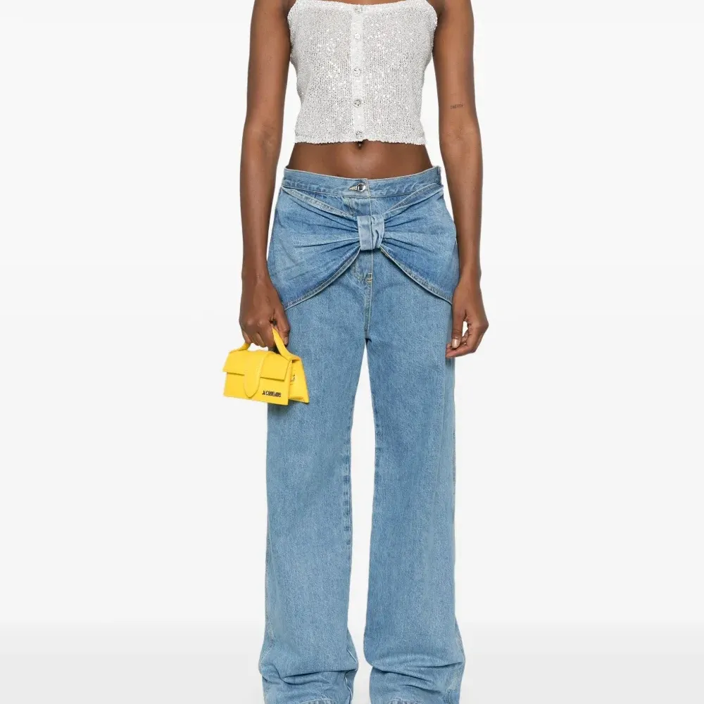 Джинсы с бантом