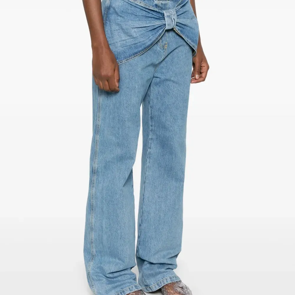 Джинсы с бантом