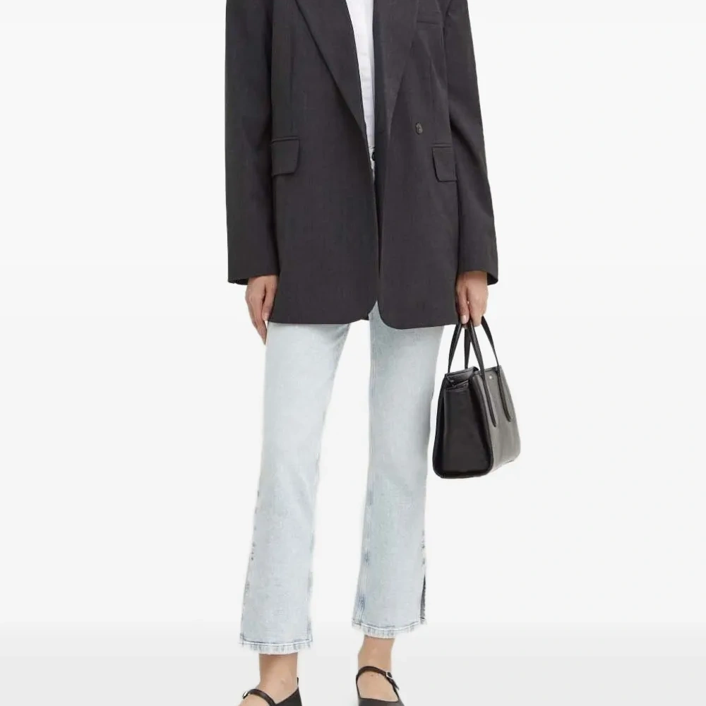 Джинсы с разрезами по бокам