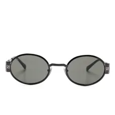 Солнцезащитные очки в круглой оправе