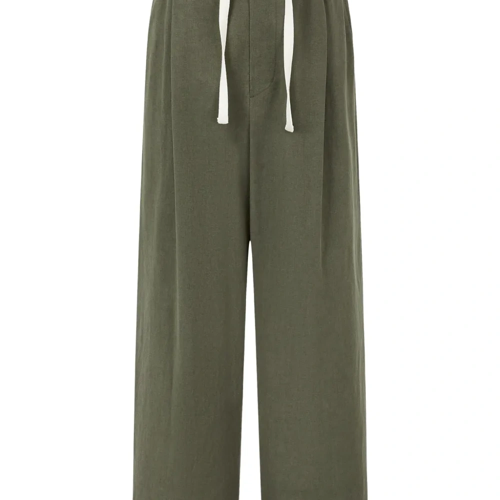 Брюки с защипами