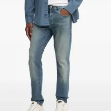 Джинсы на пуговицах