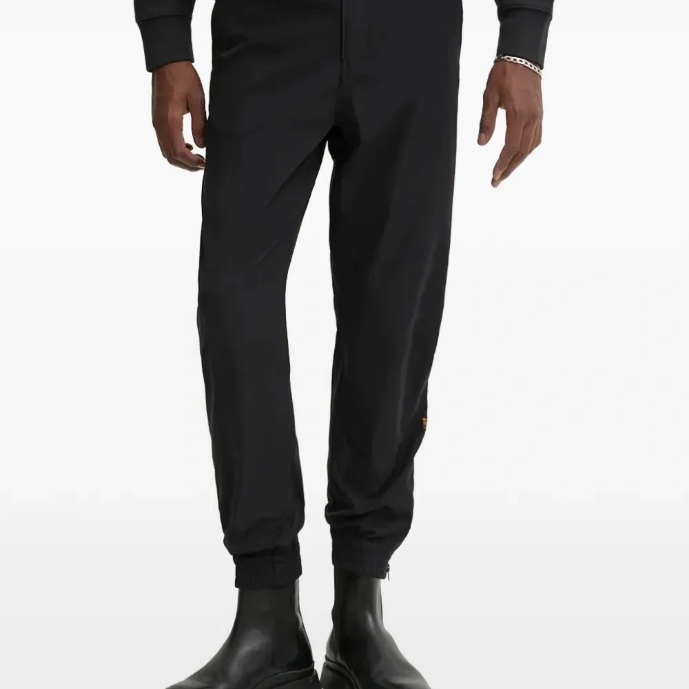 Спортивные брюки с молниями