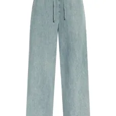 Джинсы с эффектом потертости Джинсы с эффектом потертости