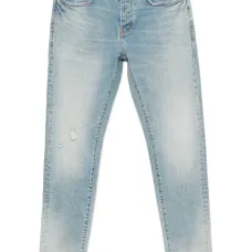 Джинсы с эффектом потертости