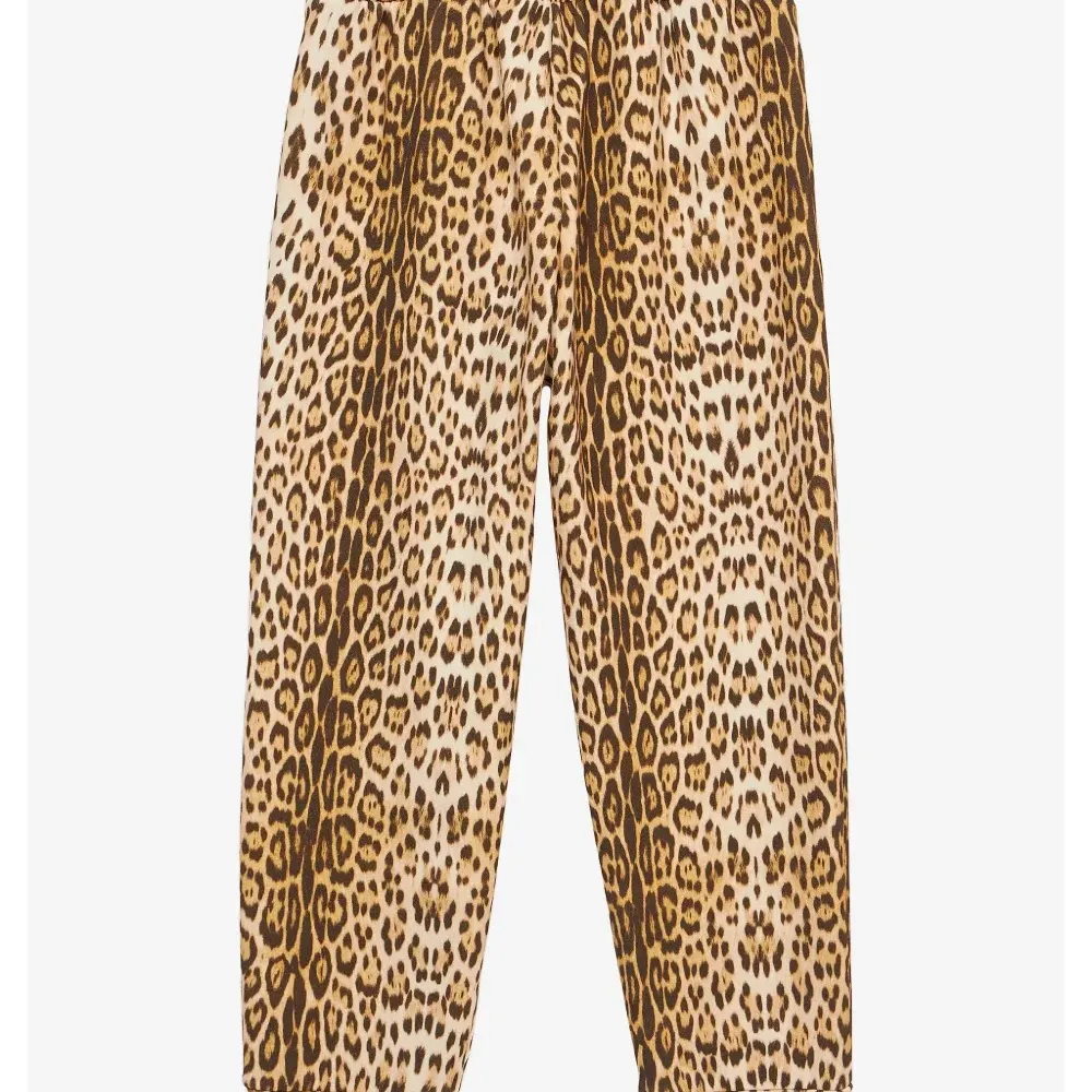 Брюки с леопардовым принтом Брюки с леопардовым принтом