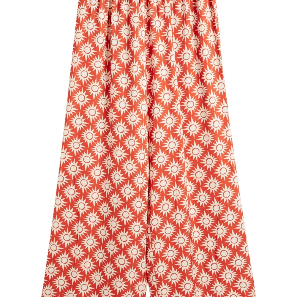 Брюки с принтом из коллаборации с Laura Whitmore